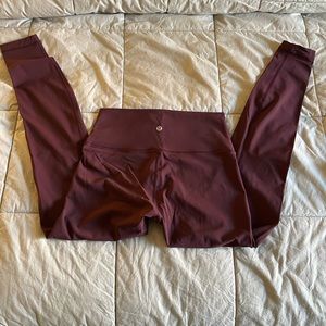 Lululemon 
Size: 6 high-rise
Color: dark purple 
Inseam: 28”